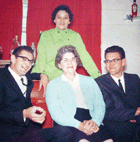 Wally's wife and family taken after his funeral, trying to look happy